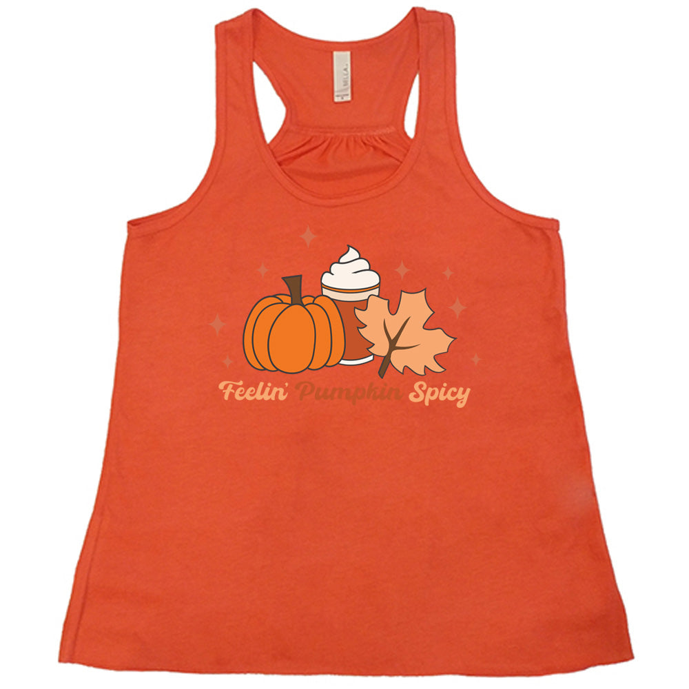 Coral colored flowy tank with pumpkin, coffee, and fall leaf graphic on it that says "Feelin' Pumpkin Spicy"