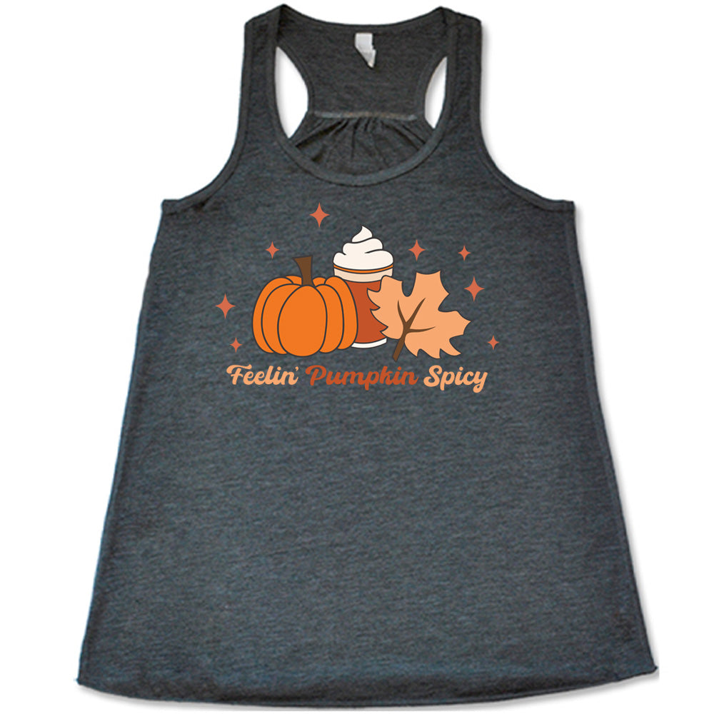 Grey colored flowy tank with pumpkin, coffee, and fall leaf graphic on it that says "Feelin' Pumpkin Spicy"