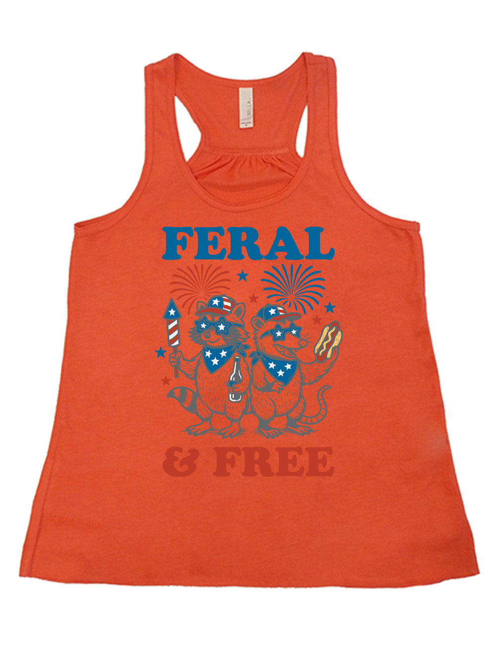 coral flowy racerback tank with the words "feral & free" around the graphic of two racoons, both wearing American flag hats, sunglasses, and bandanas, one holding a firework and a beer bottle, the other holing a hotdogs, and fireworks going off above, and a few little stars