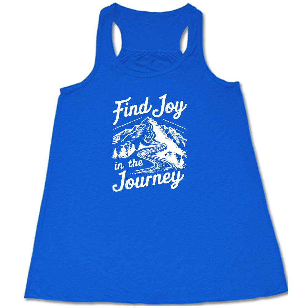 Blue colored flowy tank with a mountain road graphic on it that says "Find Joy In The Journey"