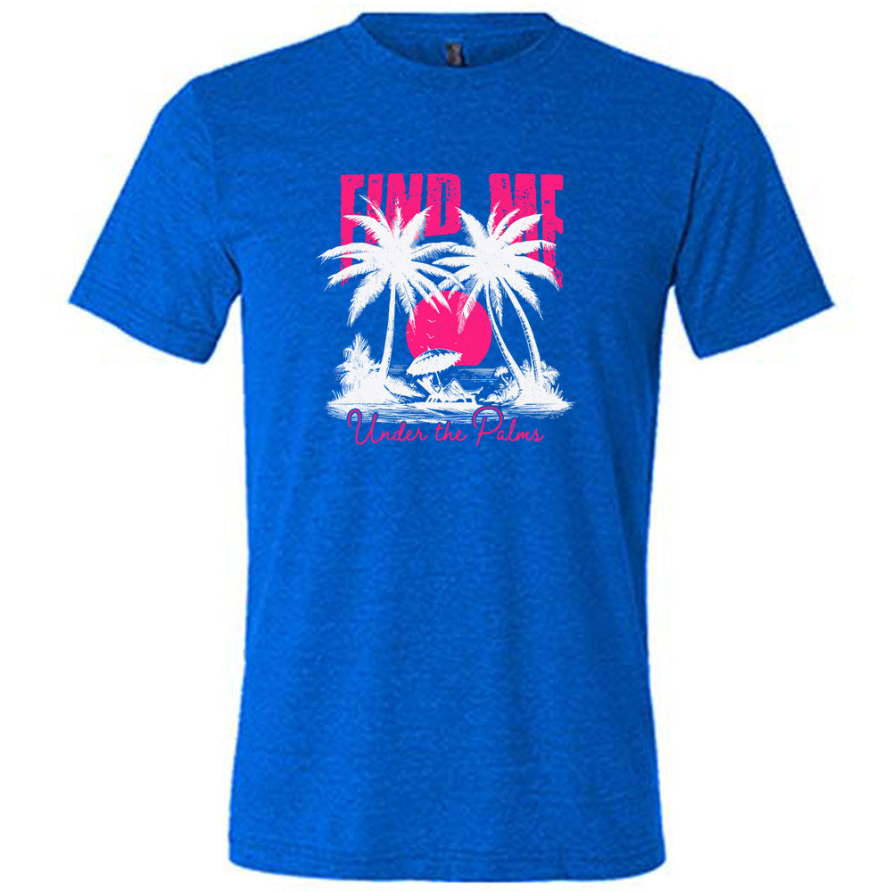Blue colored shirt with a beach and palm trees graphic on it that says "Find Me Under The Palms"