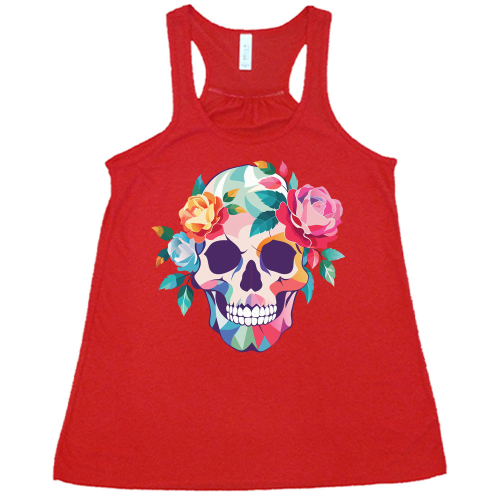 red flowy racerback tank with the colorful graphic of a skull, with flowers adorning it's head