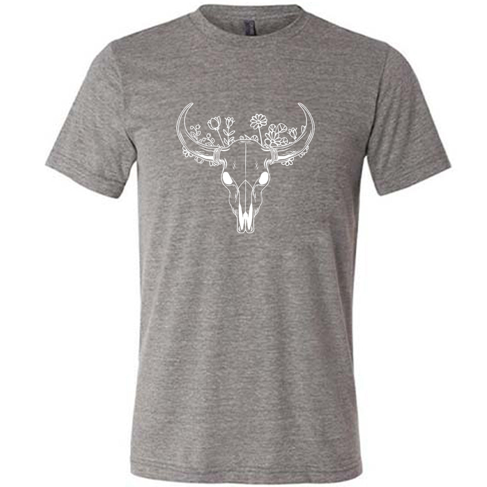 Grey colored shirt with a floral cow skull graphic on it