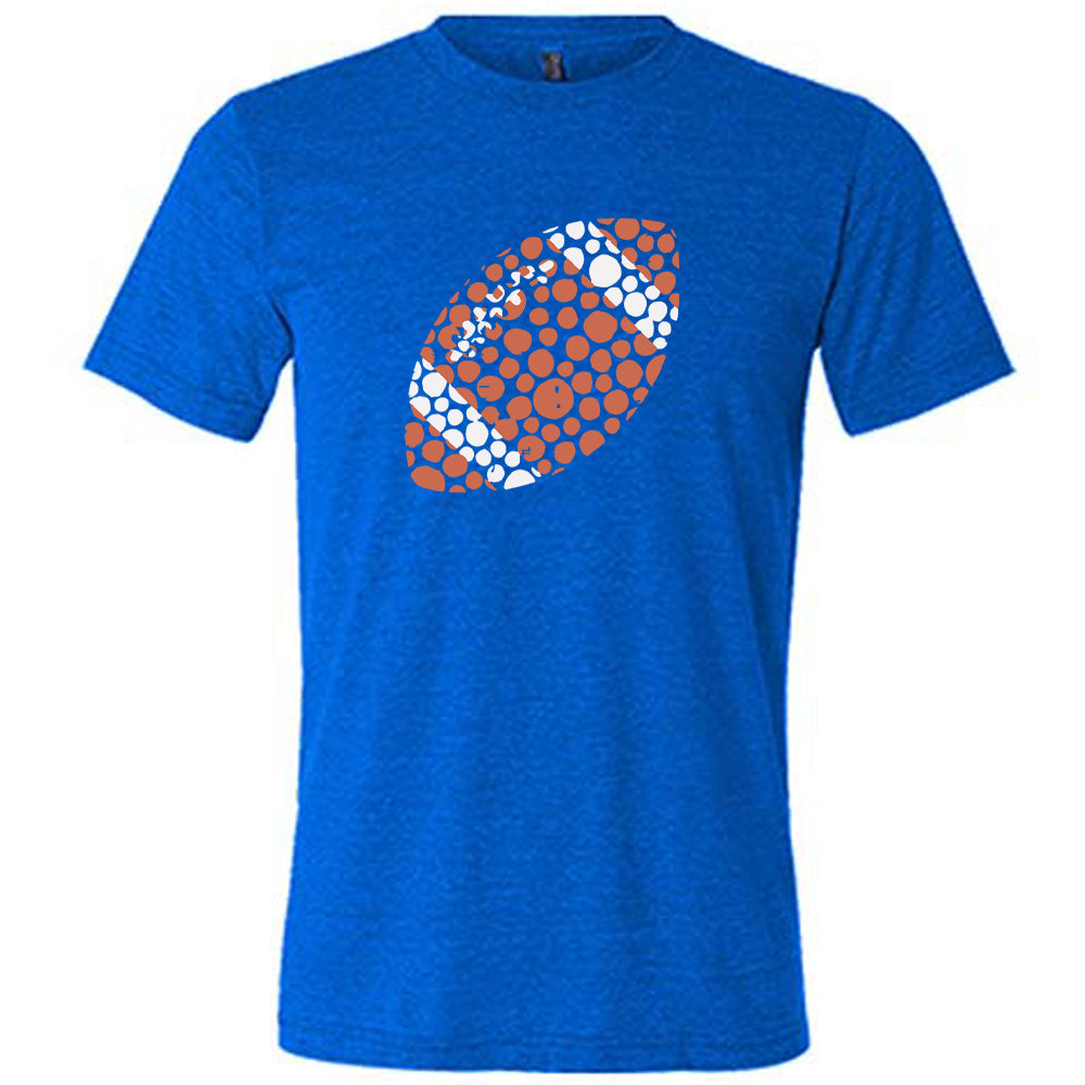 Blue colored shirt with football made up of dots graphic on it