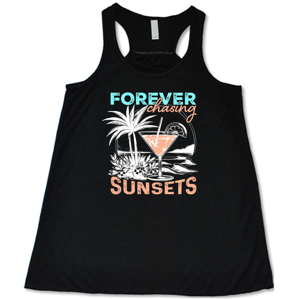 Black colored flowy tank with a drink on the beach graphic on it that says "Forever Chasing Sunsets"