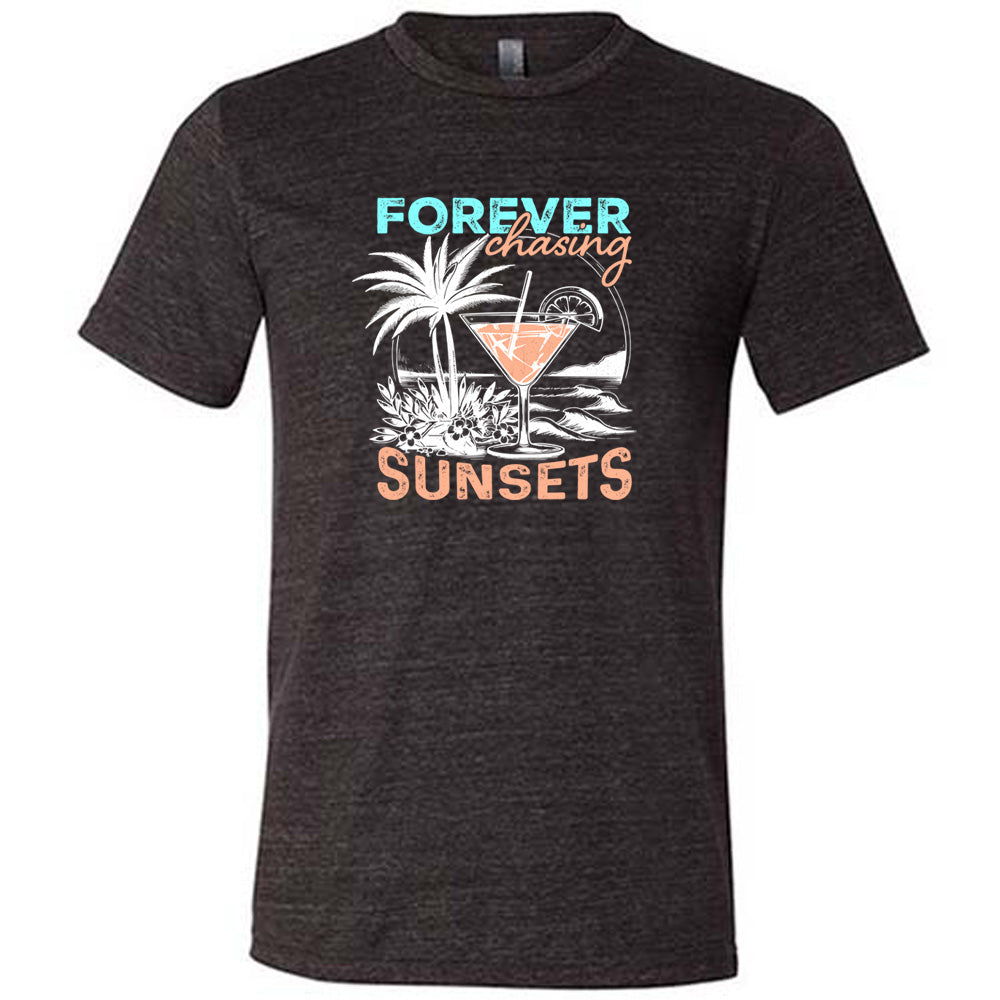 Black colored shirt with a drink on the beach graphic on it that says "Forever Chasing Sunsets"