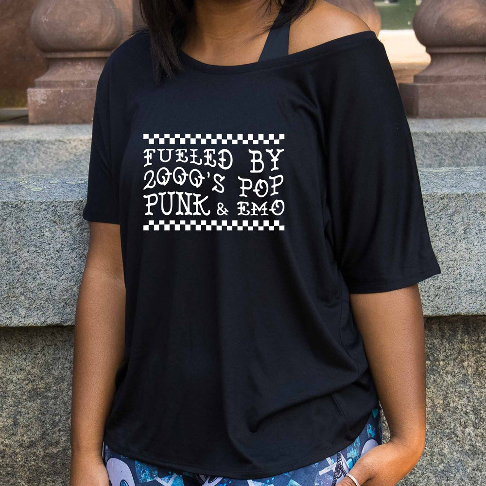 black slouchy shirt with the text "Fueled By 2000's Pop Punk & Emo" on it