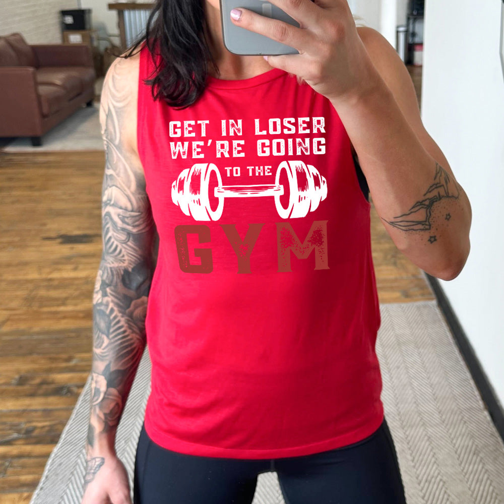 red muscle tank with the words "get in loser we're going to the gym" with a big barbell graphic
