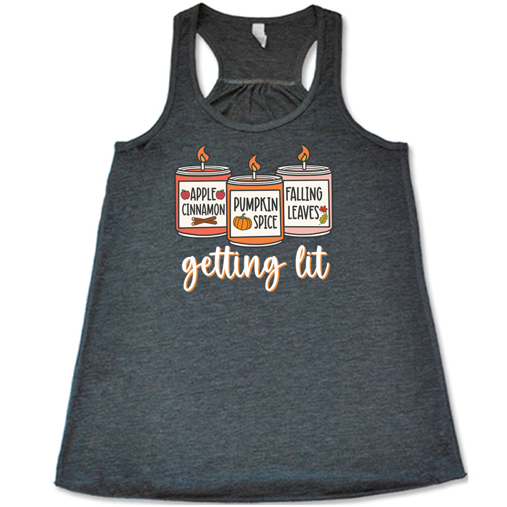 Grey colored flowy tank with fall scented candles graphic on it that says "getting lit"