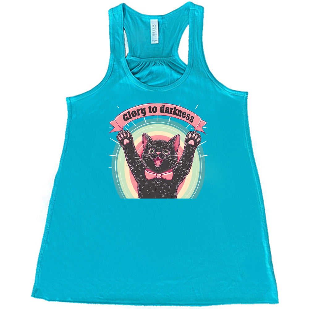 teal shirt with the saying "Glory To Darkness" on it