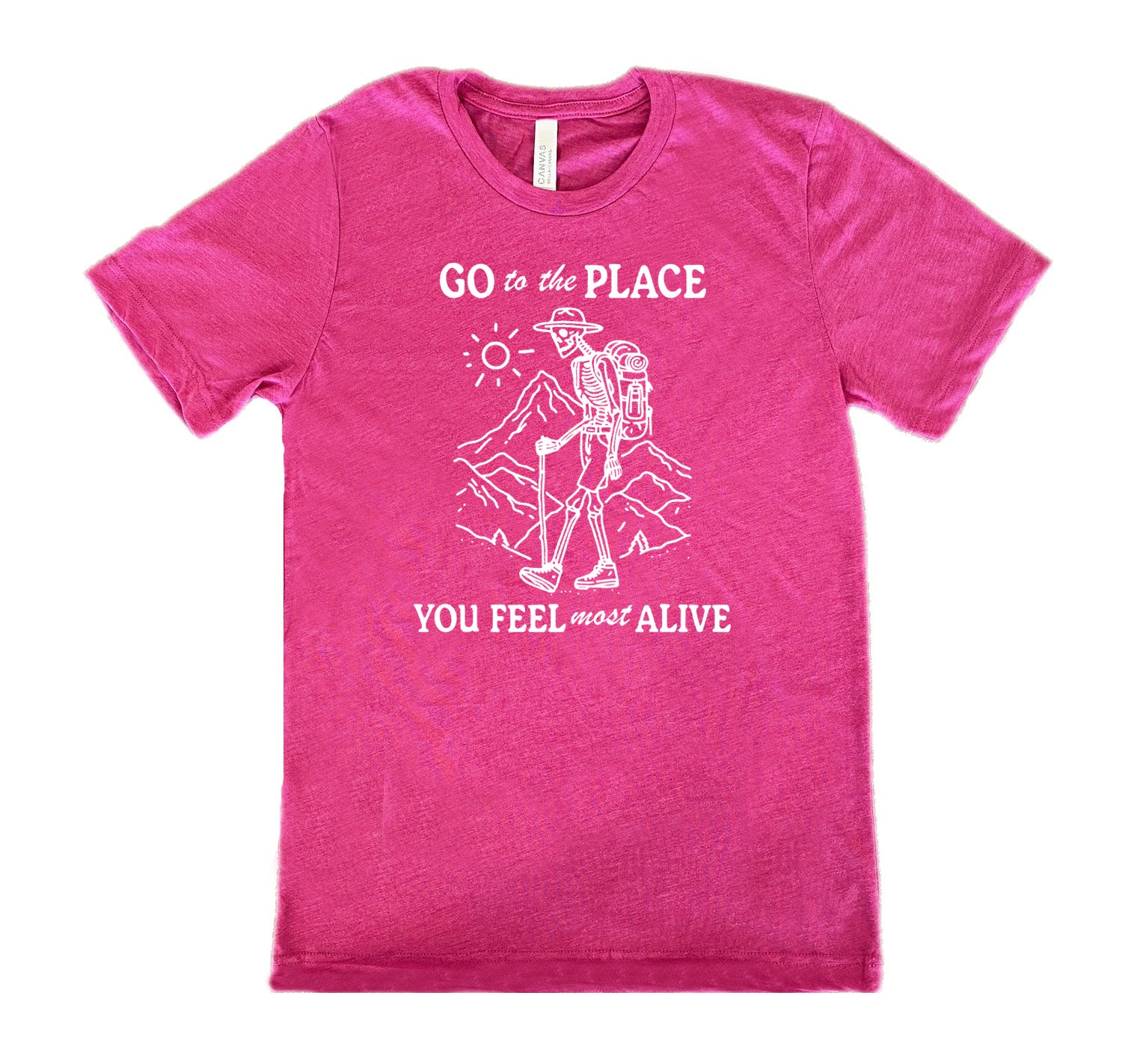 Berry colored shirt with a skeleton on a hike graphic on it that says "Go To The Place You Feel Most Alive"