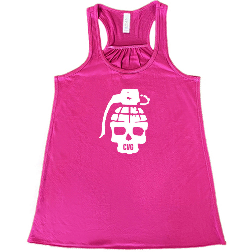 berry shirt with a grenade skull graphic on it