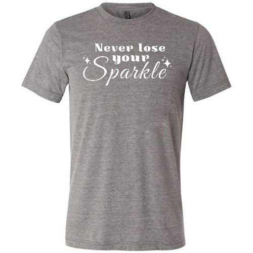 grey unisex shirt with the saying "Never Lose Your Sparkle" on it