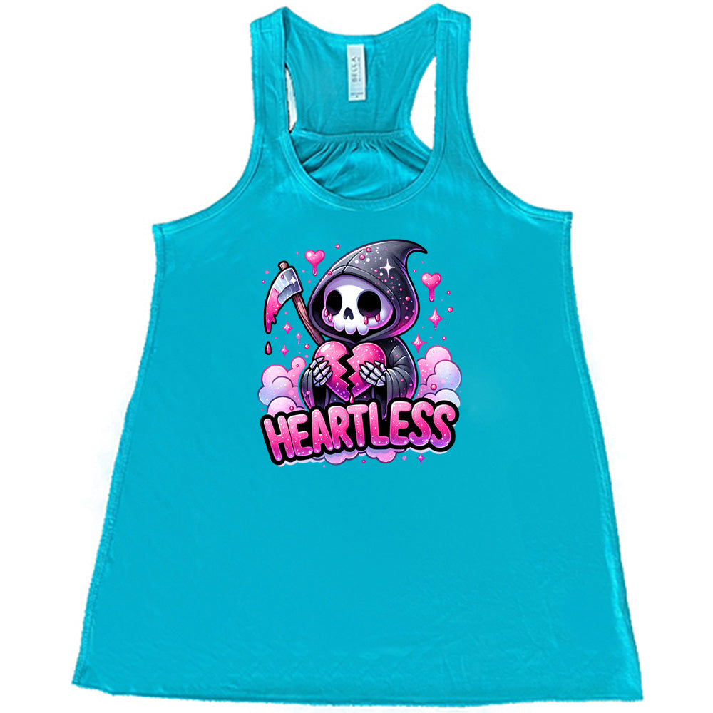 teal shirt with the text "Heartless" on it
