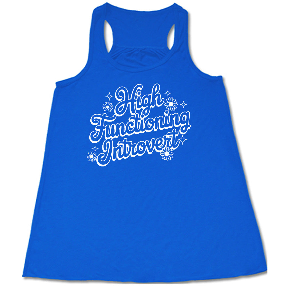 Blue colored flowy tank with a flower graphic on it that says "High Functioning Introvert"