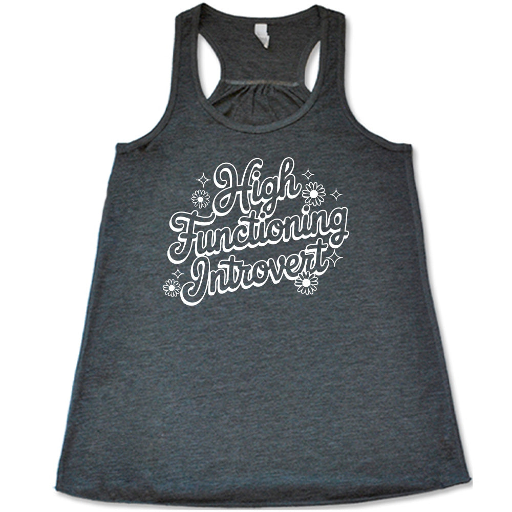 Grey colored flowy tank with a flower graphic on it that says "High Functioning Introvert"
