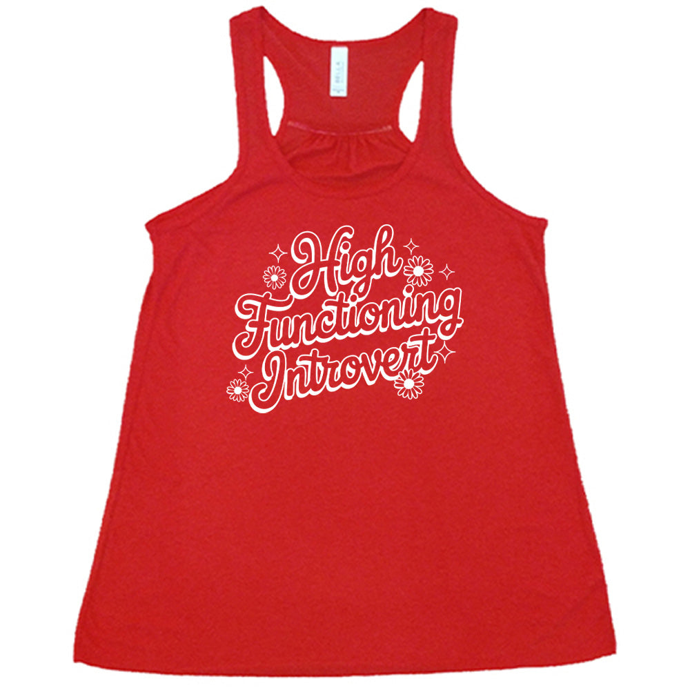 Red colored flowy tank with a flower graphic on it that says "High Functioning Introvert"