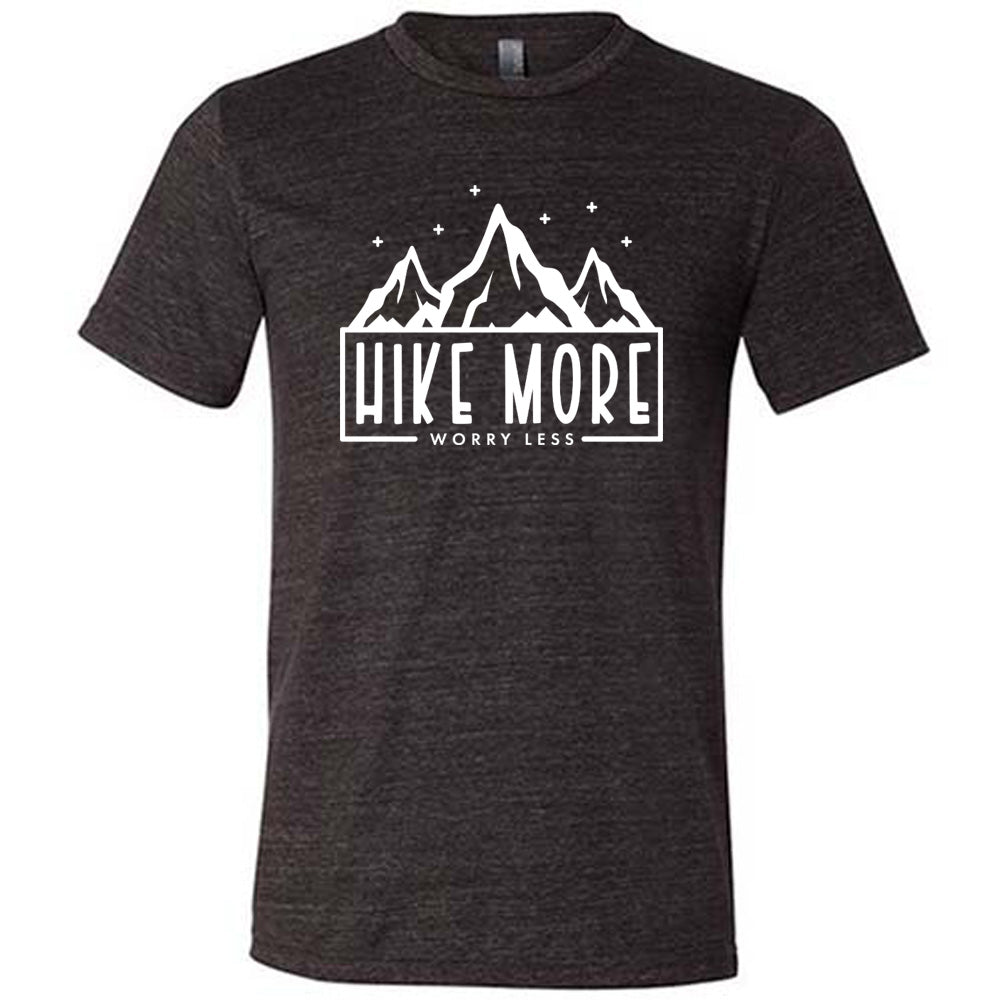 Black colored shirt with a mountains and stars graphic on it that says "Hike More Worry Less"