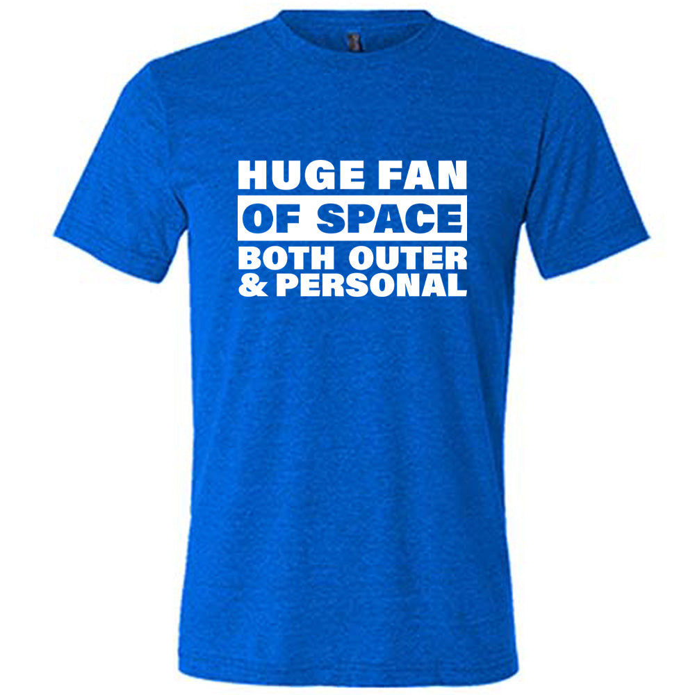 Blue colored shirt with a graphic on it that says "Huge Fan of Space, Both Outer and Personal"