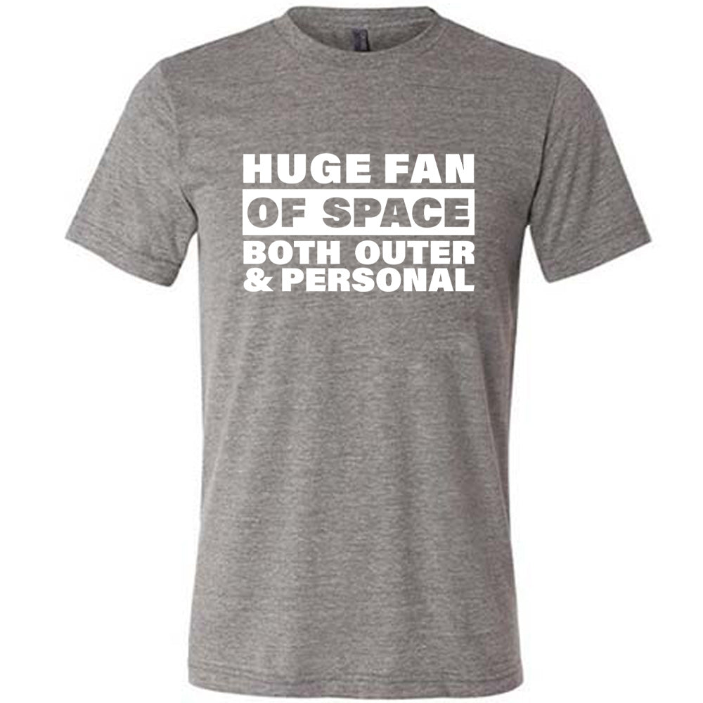 Grey colored shirt with a graphic on it that says "Huge Fan of Space, Both Outer and Personal"