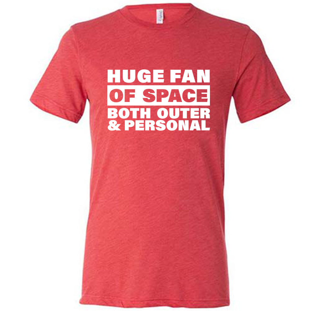 Red colored shirt with a graphic on it that says "Huge Fan of Space, Both Outer and Personal"