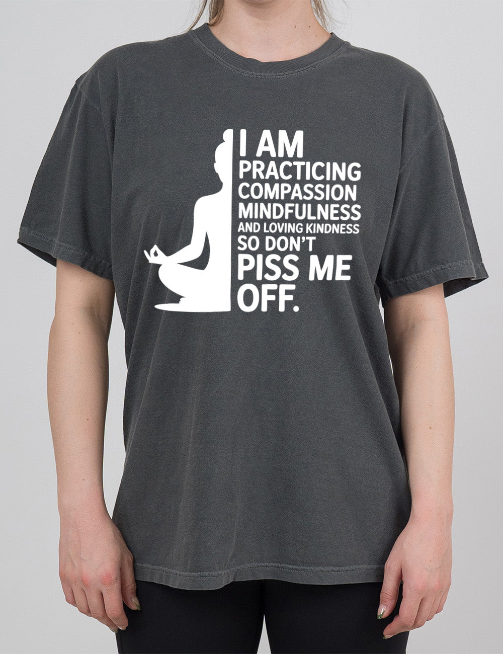 pepper modern tee with the graphic of a woman's silhouette (only one half of it) next to the words saying "I am practicing compassion mindfulness and loving kindness so don't piss me off."