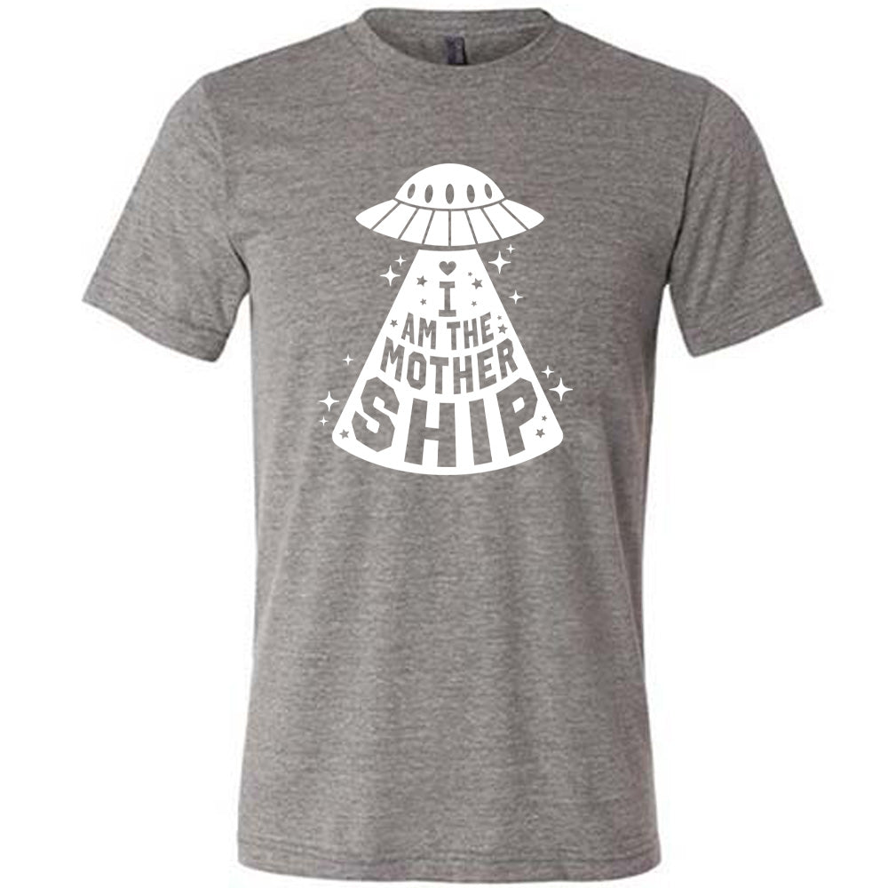 grey unisex tee with the words "I am the mothership" on it within the beam of a UFO, with a heart above the words, and a number of stars scattered around