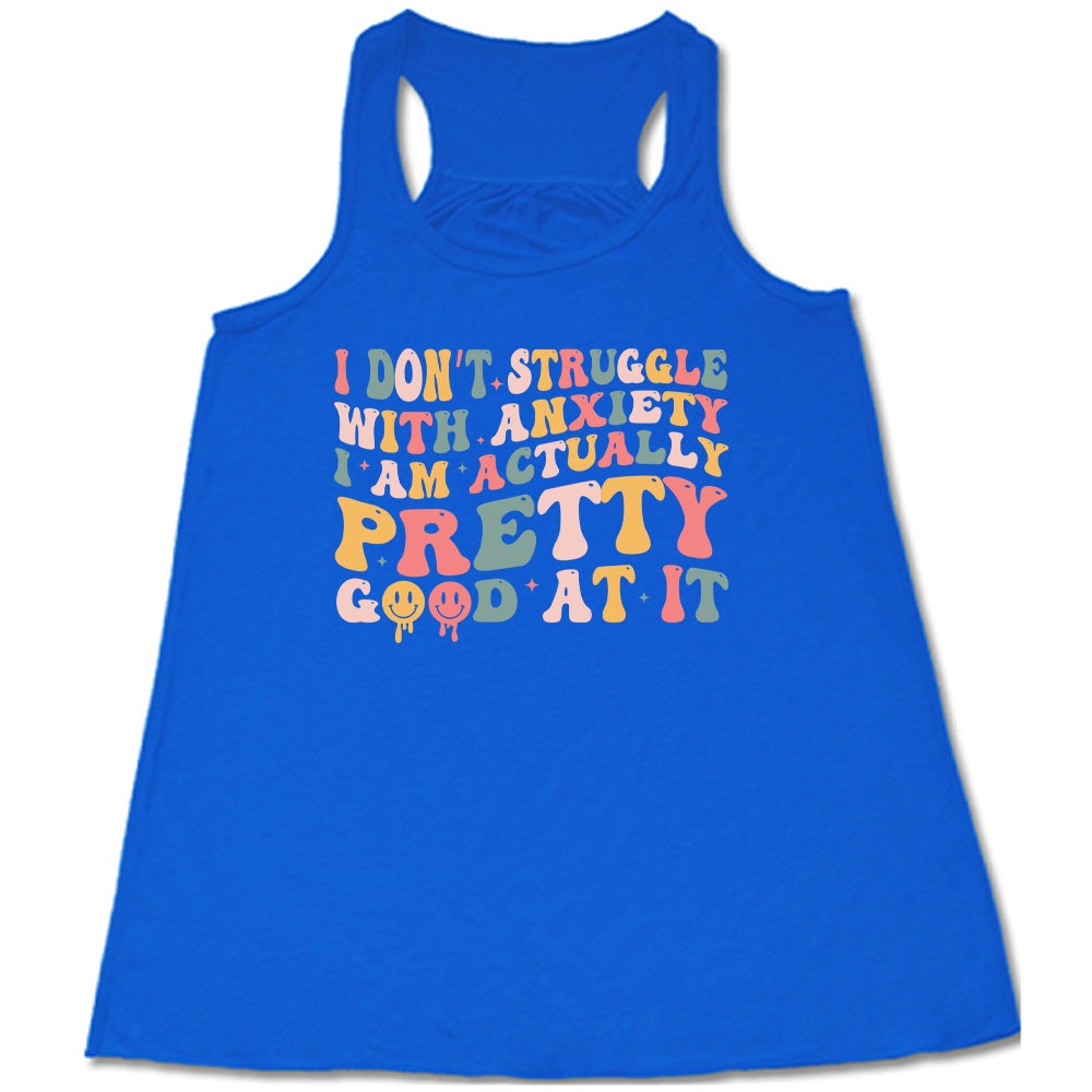 Blue colored flowy tank with a graphic on it that says "I Don't Struggle With Anxiety, I Am Actually Pretty Good At It"