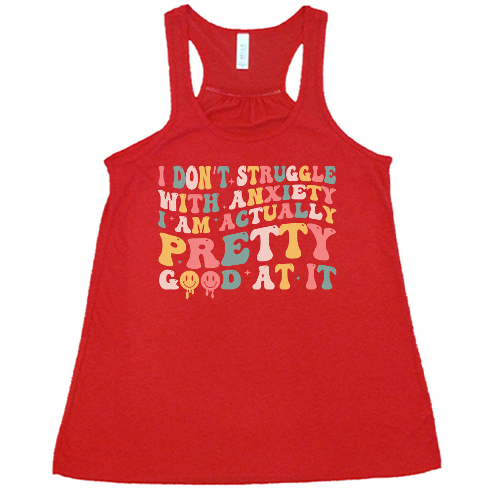 Red colored flowy tank with a graphic on it that says "I Don't Struggle With Anxiety, I Am Actually Pretty Good At It"