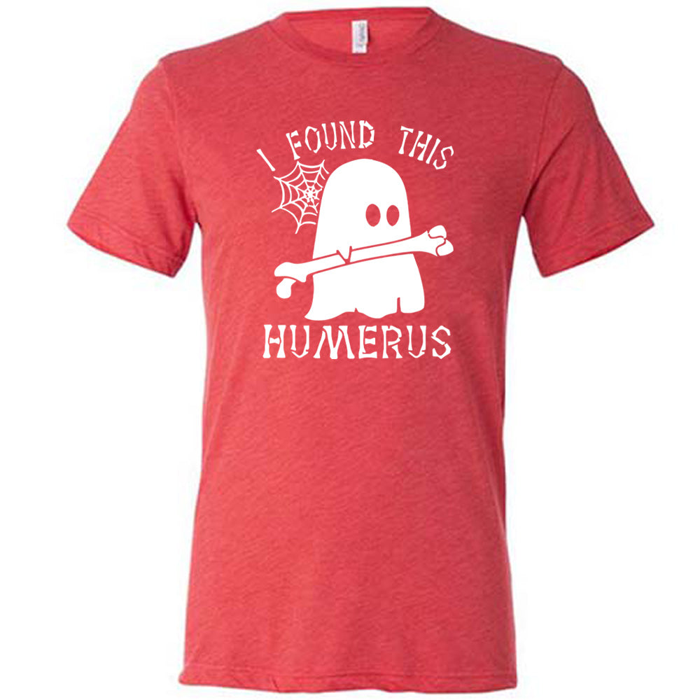 Red colored shirt with ghost holding a bone graphic on it that says "I Found This Humerus"