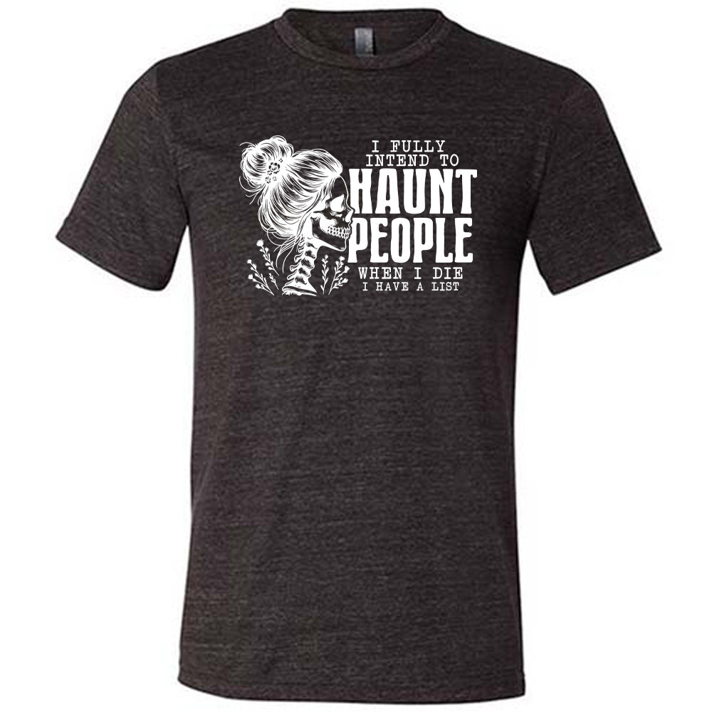 Black t-shirt with a graphic design and text that says "I Fully Intend To Haunt People" on a white background