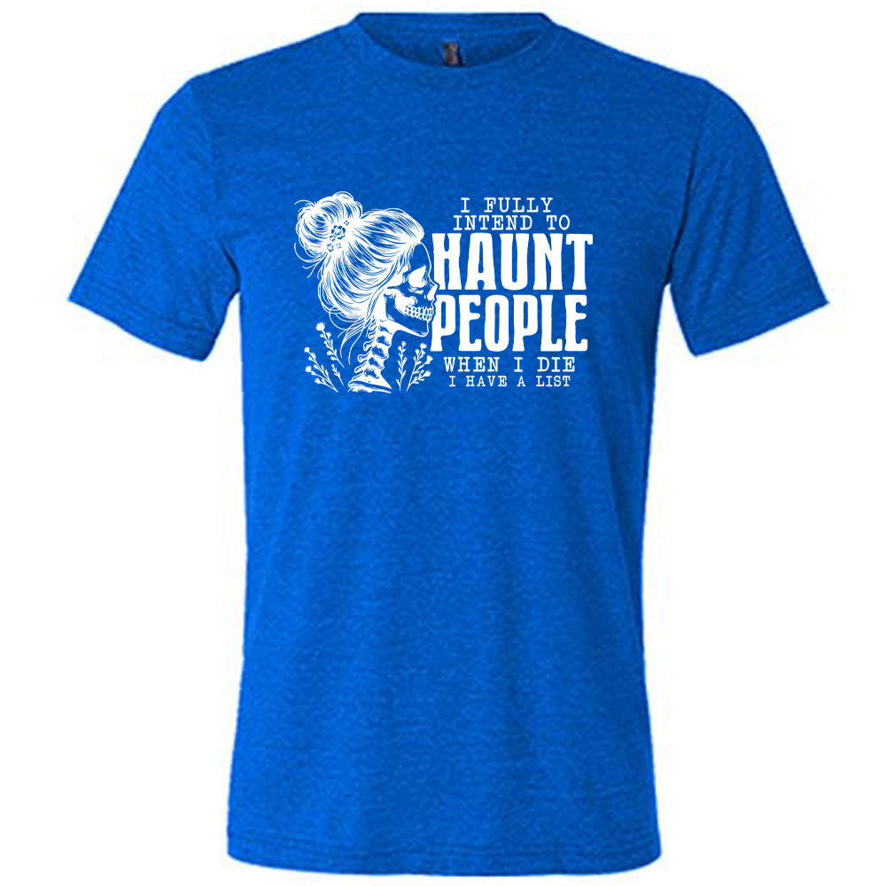 Blue colored shirt with smiling female skeleton graphic on it that says "I Fully Intend To Haunt People When I Die I Have A List"