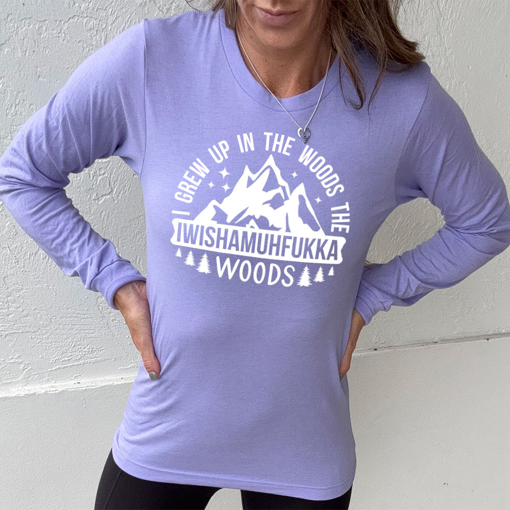 heather dark lavender long sleeve with the words "I grew up in the woods the Iwishamuhfukka woods" on it, with the graphic of mountains and trees and stars