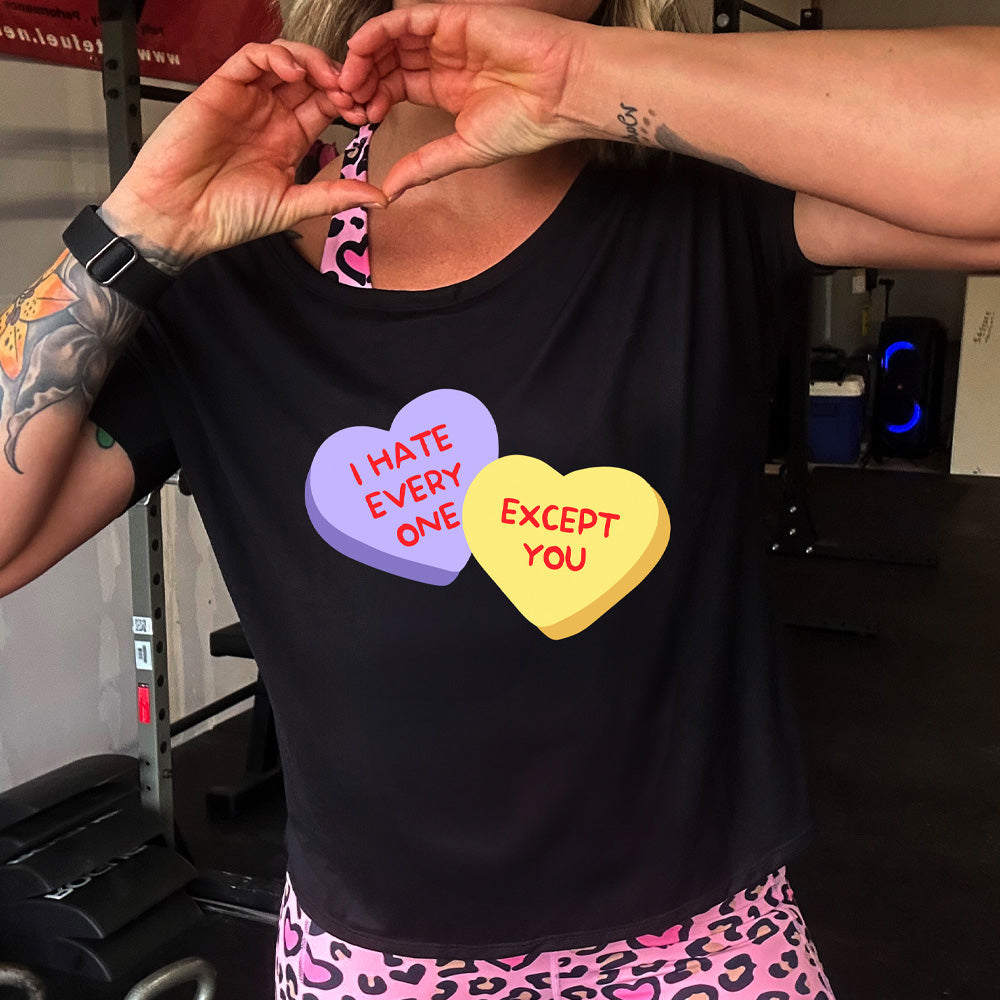 black slouchy shirt with the text "I Hate Everyone Except You" on it