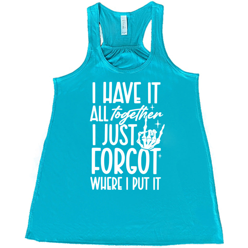 teal flowy tank with the words "I have it all together I just forgot where I put it" on it, with the graphic of a rocker hand and a few little stars