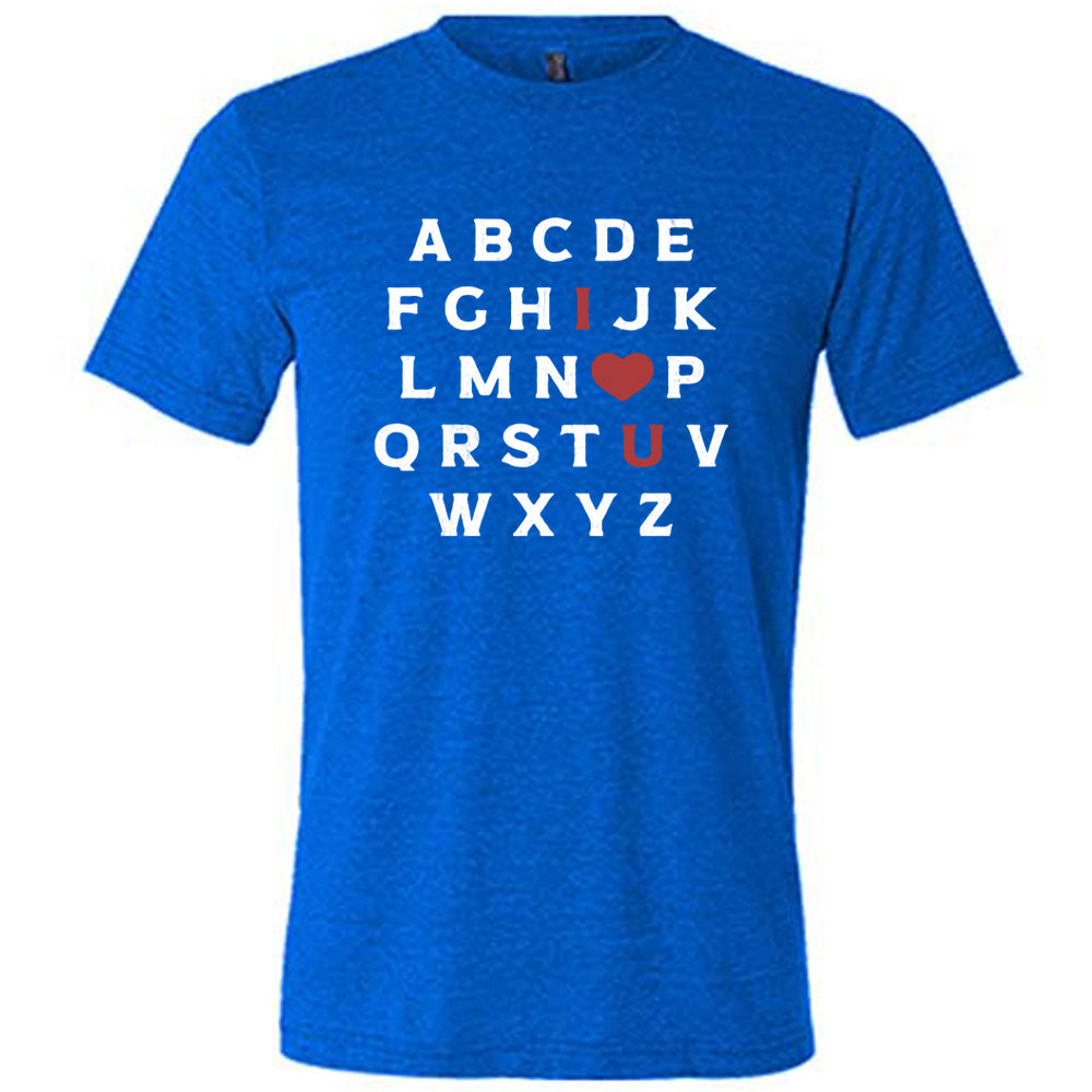 blue unisex tee with the alphabet on it in white lettering, but with the "I" in red, the "O" turned into a red heart, and "U" in red