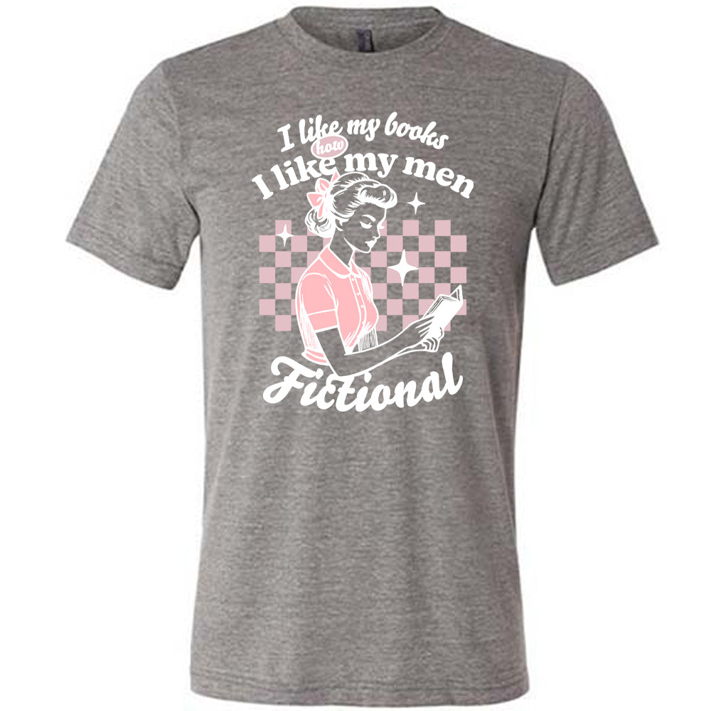 Grey unisex tee, wording that says I Like My Books How I Like My Men, Fictional, woman reading a book with checkered background