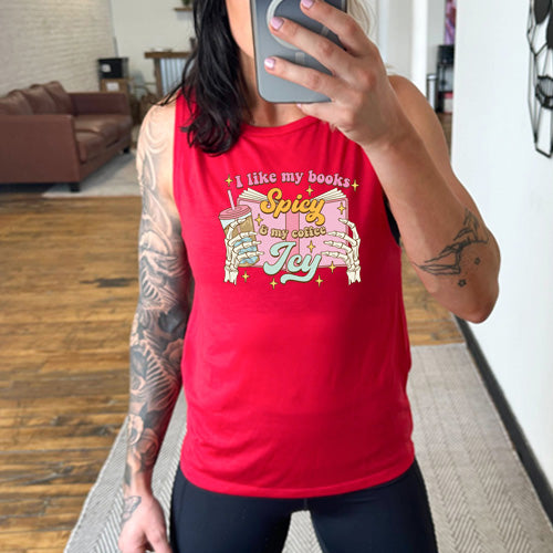 model wearing a red muscle tank top with the saying "I Like My Books Spicy And My Coffee Icy" on it