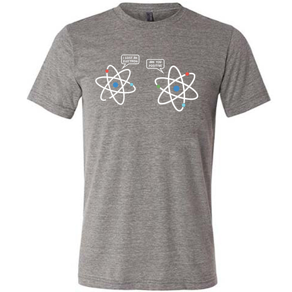 Grey colored shirt with atom graphic on it that says "I Lost An Electron. Are You Positive?"