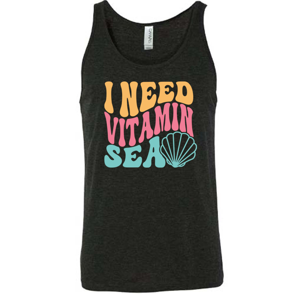Black colored tank with a shell graphic on it that says "I Need Vitamin Sea"