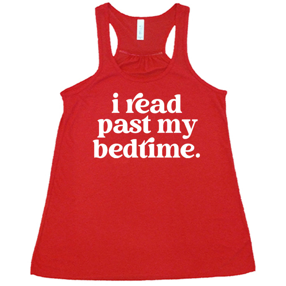 Red flowy tank with i read past my bedtime. - all lowercase in white lettering