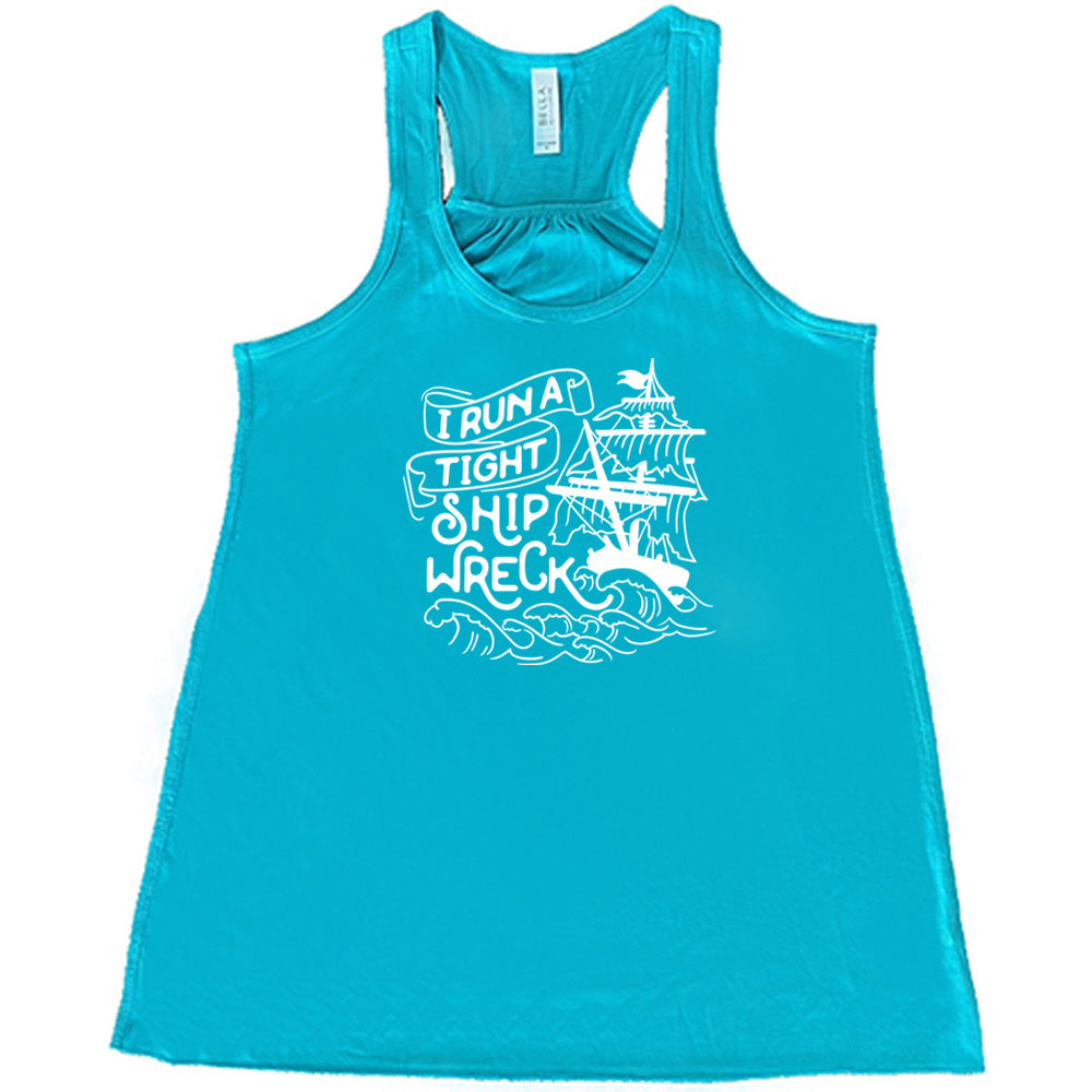 Teal colored flowy tank with a sea ship graphic on it that says "I Run a Tight Shipwreck"