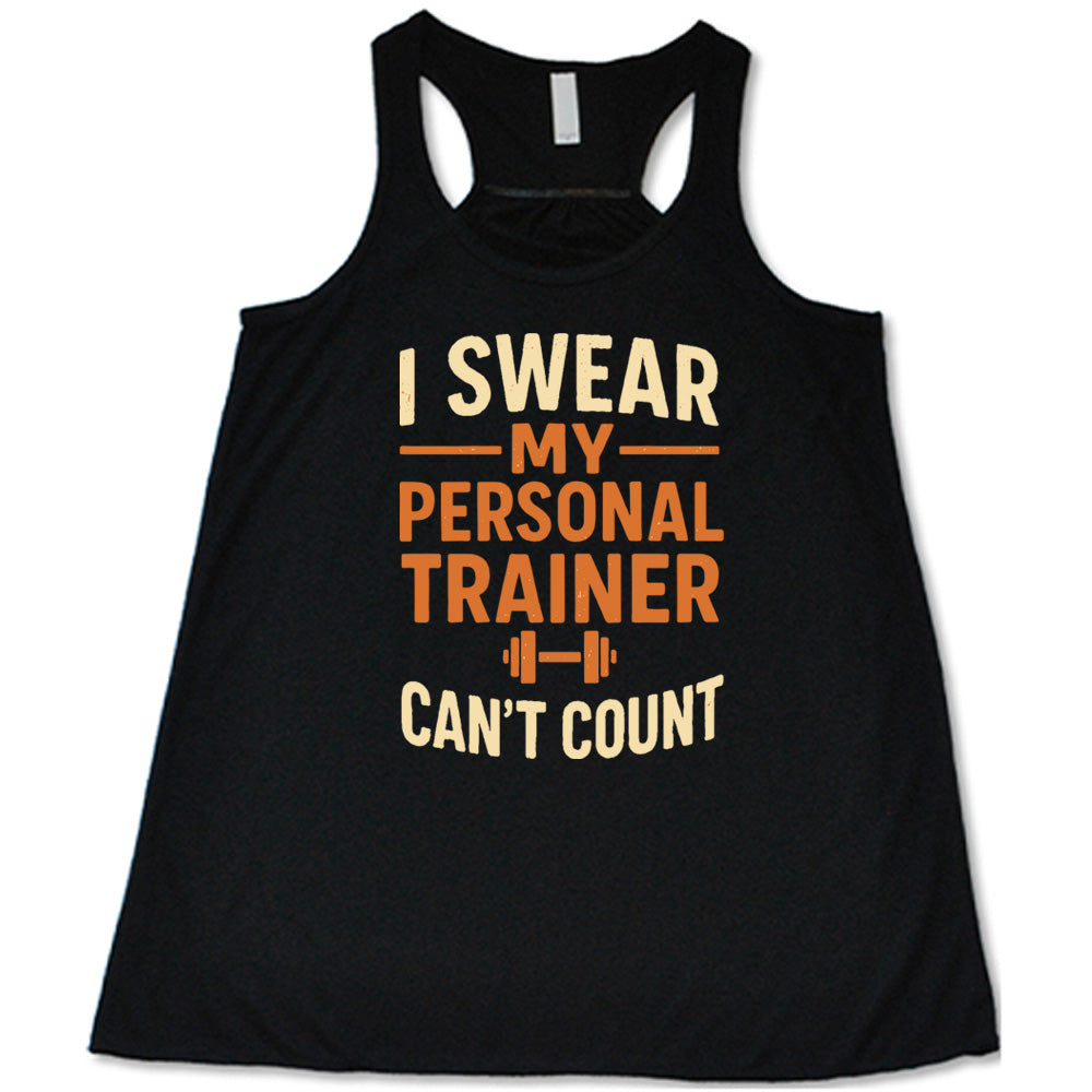 black flowy tank with the words "I swear my personal trainer can't count" on it, and the small image of a barbell