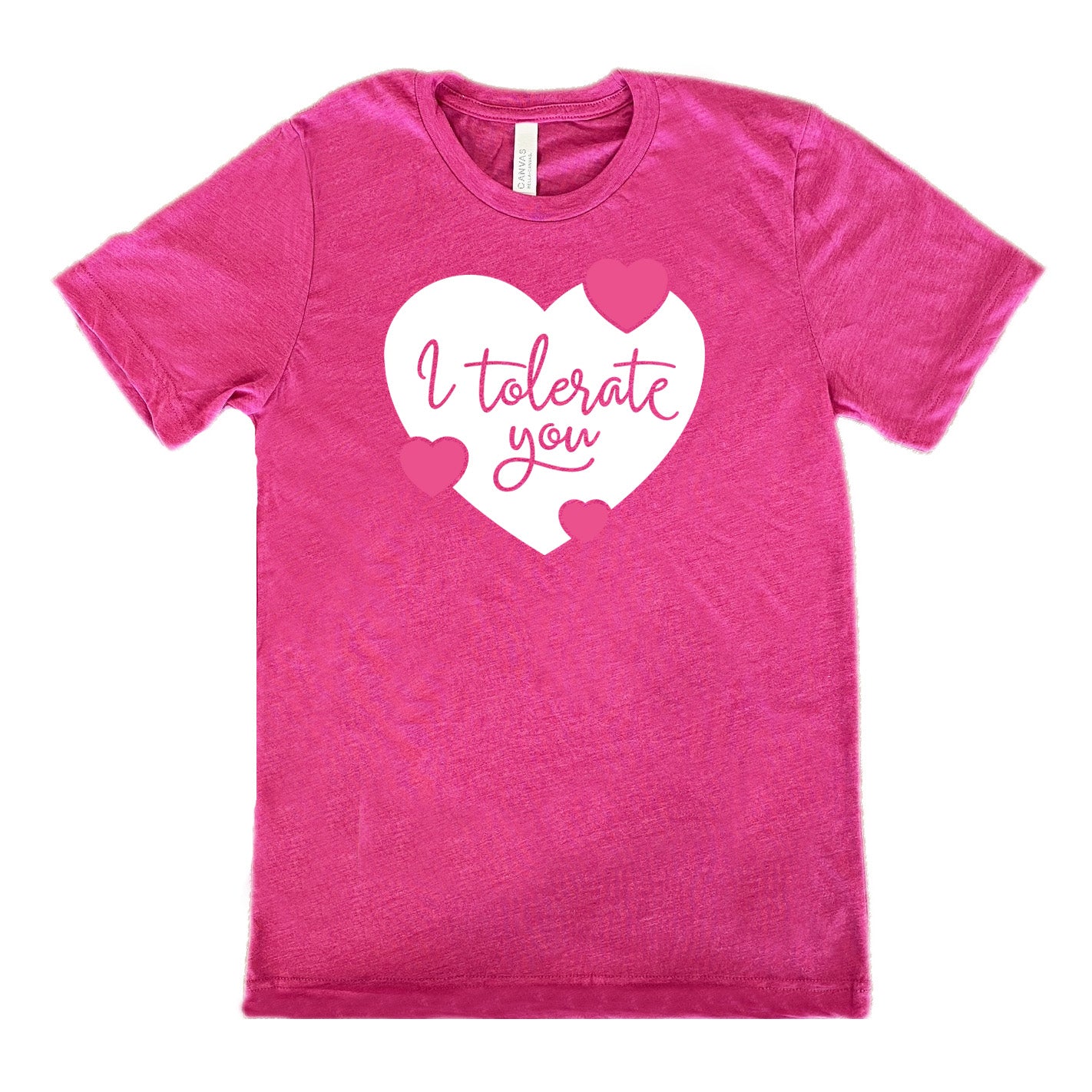 berry unisex tee with the words "I tolerate you" in berry lettering on it, within a white heart graphic that has three small pink hearts overlapping on its edges