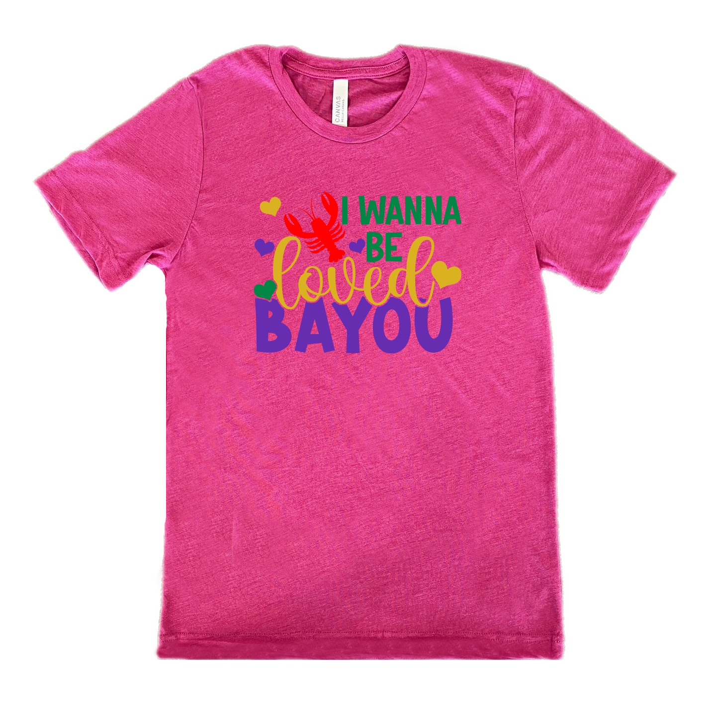 berry unisex tee with the words "I wanna be loved bayou" on it in varied fonts, with the small graphics a few hearts and one lobster