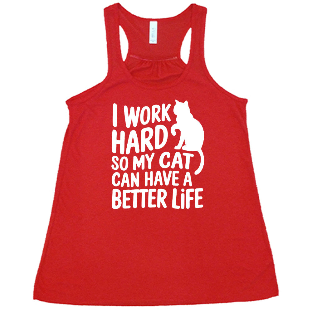 Red colored flowy tank with cat silhouette graphic on it that says "I Work Hard So My Cat Can Have A Better Life"