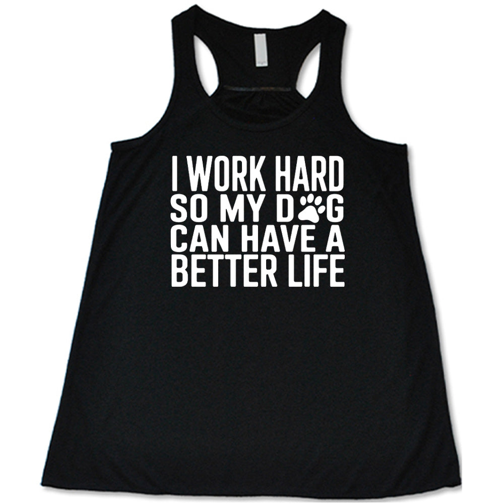 Black colored flowy tank with paw print graphic on it that says "I Work Hard So My Dog Can Have A Better Life"