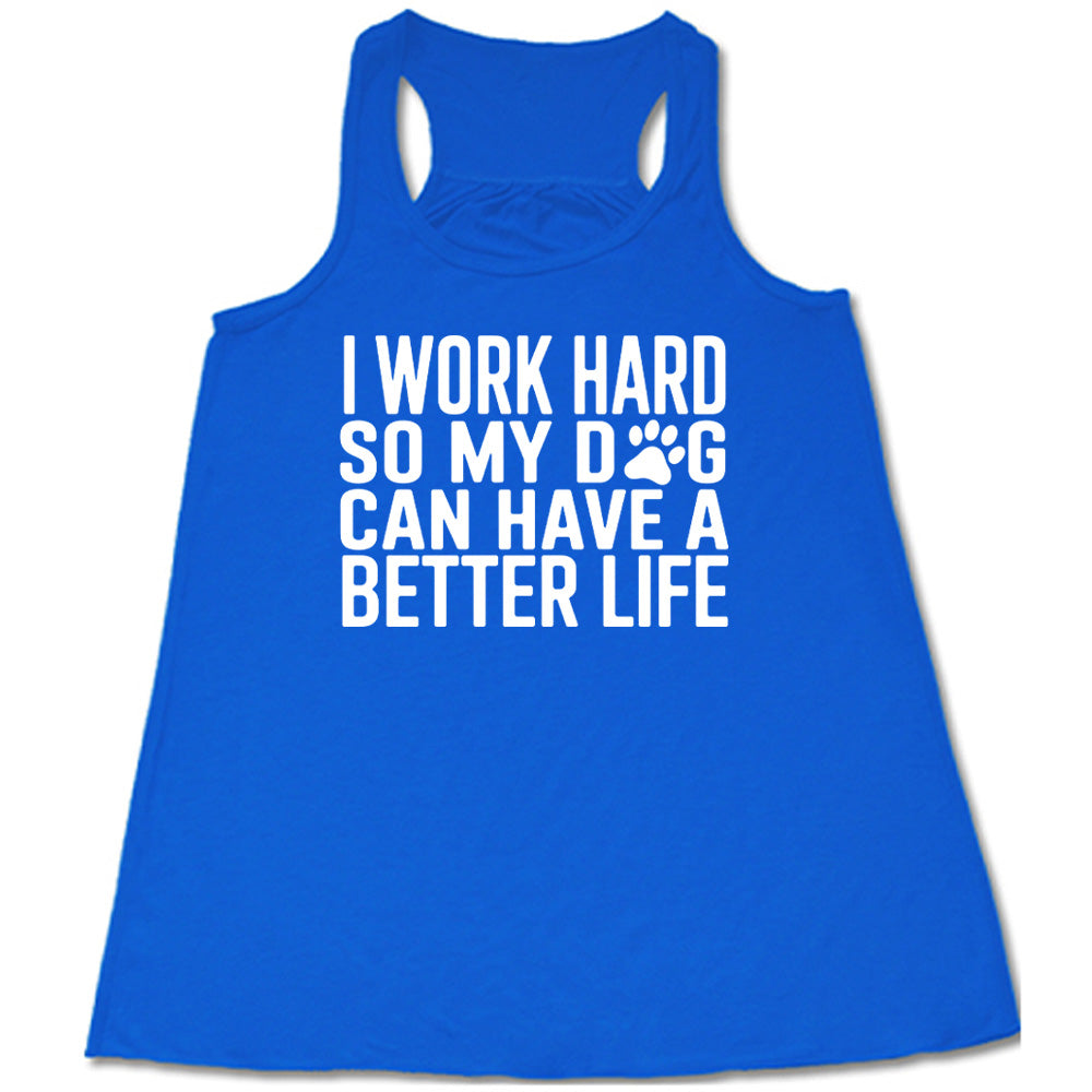 Blue colored flowy tank with paw print graphic on it that says "I Work Hard So My Dog Can Have A Better Life"