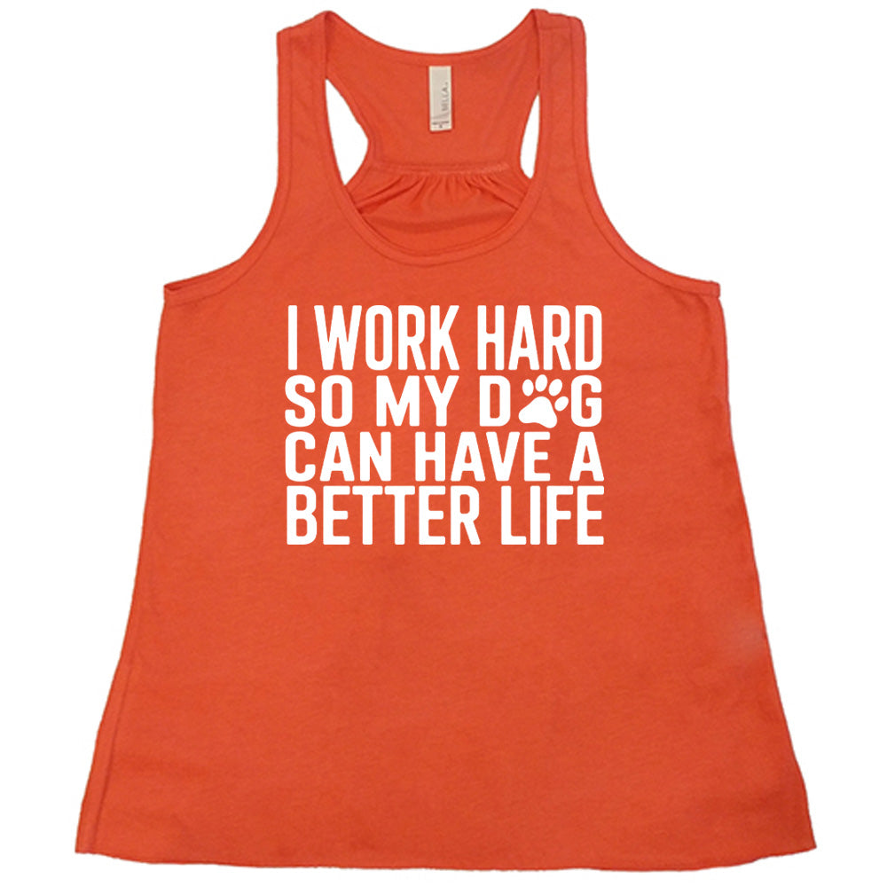 Coral colored flowy tank with paw print graphic on it that says "I Work Hard So My Dog Can Have A Better Life"