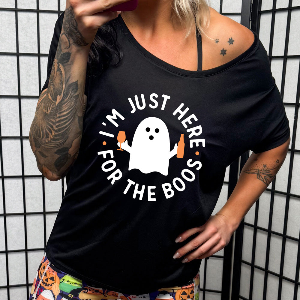 shirt with ghost holding wine glass and bottle graphic on it that says "I'm Just Here For The Boos"